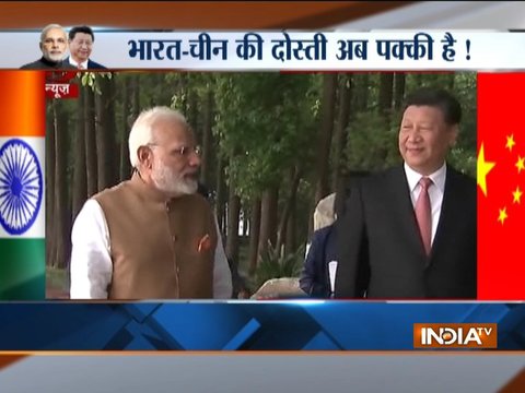 Prime Minister Narendra Modi & Chinese President Xi Jinping inside a house boat in Wuhan's East Lake