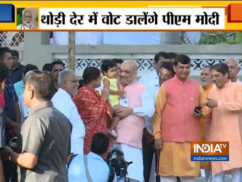 Amit Shah arrives with family at polling booth in Ahmedabad