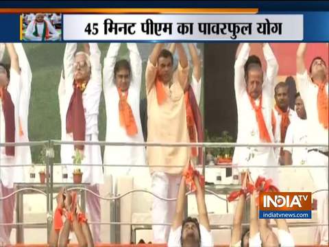 Cabinet Minister Nitin Gadkari performs yoga in Nagpur on International Yoga Day