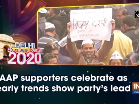 Delhi election results: AAP supporters celebrate as early trends show party's lead