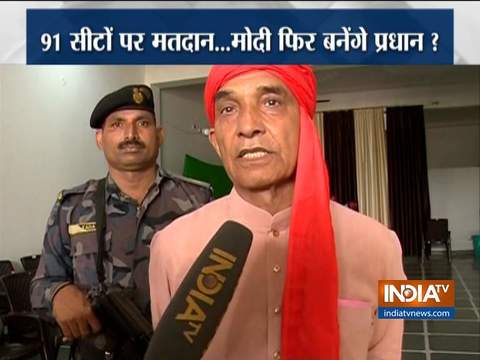 BJP leader Satyapal Singh arrives with his family at a polling booth in Bagpat