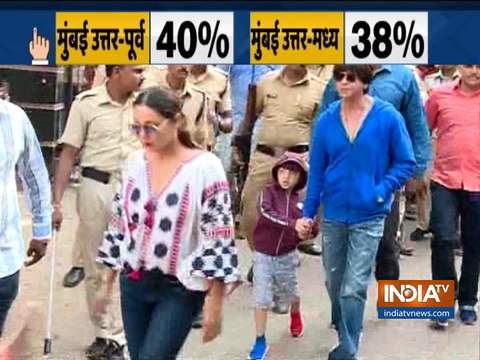 Actor Shah Rukh Khan and Vivek Vivek Oberoi exercise their voting right in Mumbai