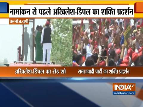 Akhilesh and Dimple Yadav hold a roadshow in Kannauj, UP