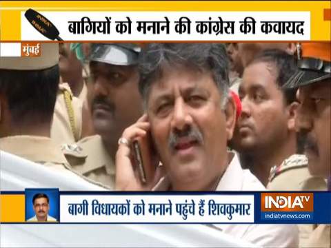 Police stops Congress' D K Shivakumar from entering Renaissance hotel in Mumbai