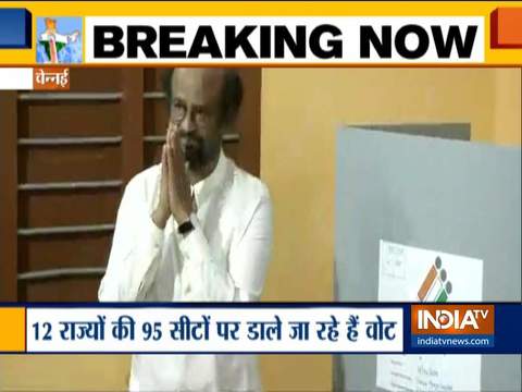 Actor turned politician Rajinikanth casts his vote at the polling station in Chennai