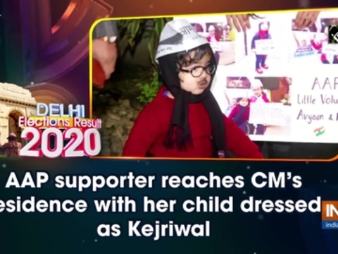 AAP supporter reaches CM's residence with her child dressed as Kejriwal