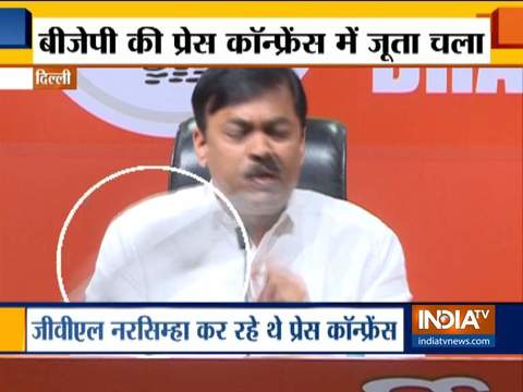 Shoe hurled at BJP MP GVL Narasimha Rao during a press conference at BJP HQ in Delhi