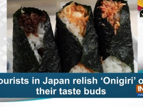 Tourists in Japan relish 'Onigiri' on their taste buds