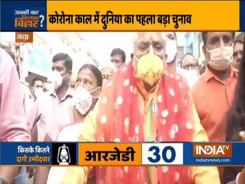 Polling underway in Bihar, minister Prem Kumar rides cycle to polling booth to cast his vote