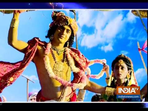 Krishna flaunts his muscular prowess carrying Govardhan Parbat on his little finger