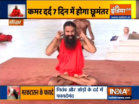 Swami Ramdev shows how to stay fit by doing Aerial Yoga