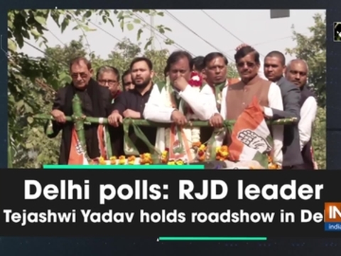 Delhi polls: RJD leader Tejashwi Yadav holds roadshow in Delhi