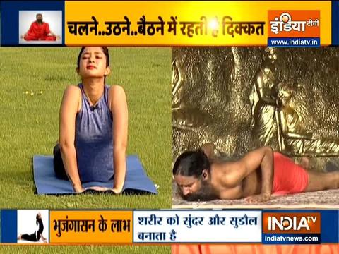 Bhujangasana is helpful in treating back pains, says Swami Ramdev