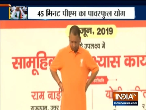 CM Yogi Adityanath performs neck exercises in Lucknow on International Yoga Day